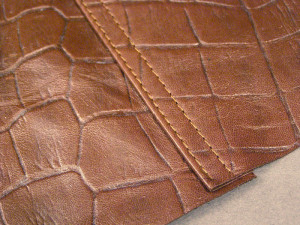 King-Kenneth-Smart-Sewing-with-Leather2_700x525